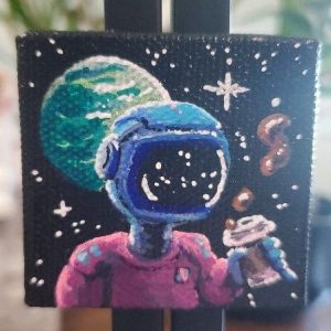 painted magnet promo shot. coffe drinking space dude